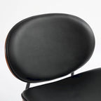 Fauteuil coquille chaise simple trépied en cuir noir fauteuil de salon finition noyer dossier confortable, couleur noire