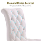 Chaises tapissées de velours avec dossier capitonné orné de cristaux et pieds cabriolets en métal miroir.