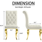 Chaises tapissées de velours avec dossier capitonné orné de cristaux et pieds cabriolets en métal miroir.